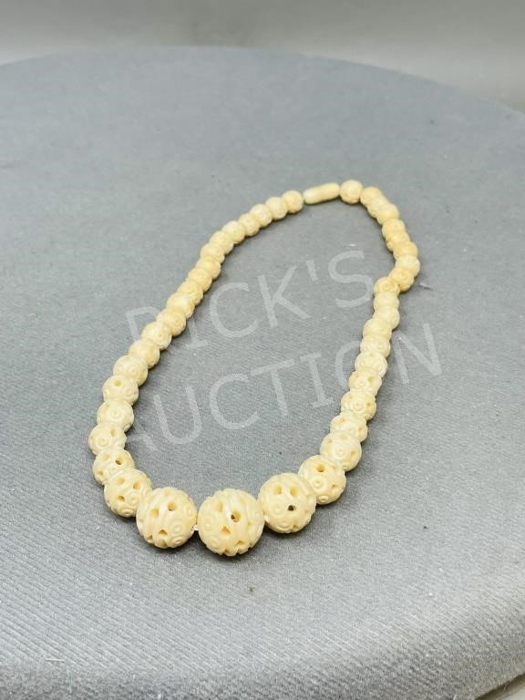 carved bone bead necklace