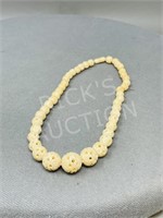 carved bone bead necklace