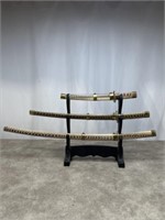 3 Swords with wooden stand