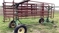 Cattle gates & gate rack on wheels, one missing
