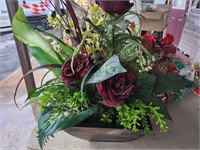floral arrangement in a metal planter box
