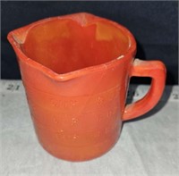 red slag glass measuring cup