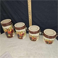 4 piece canister set small chip on large one