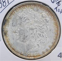 1881 UNC and Toning Morgan Silver Dollar.