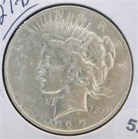 1927-D Peace Silver Dollar.