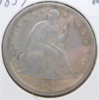 1854 Liberty Seated Dollar.