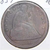 1857 Liberty Seated Dollar.