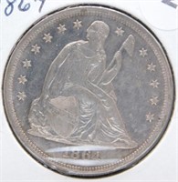 1864 Liberty Seated Dollar.