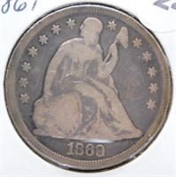 1869 Liberty Seated Dollar.