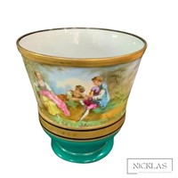 large pot urn with gold trim and scene