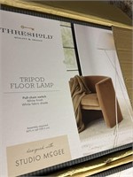 Threshold tripod floor lamp