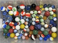 Clear tub of marbles