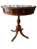 WOOD CARVED DRUM TABLE WITH BRASS CLAW FEET AND