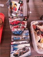 Three Lego Speed Champions car kits: