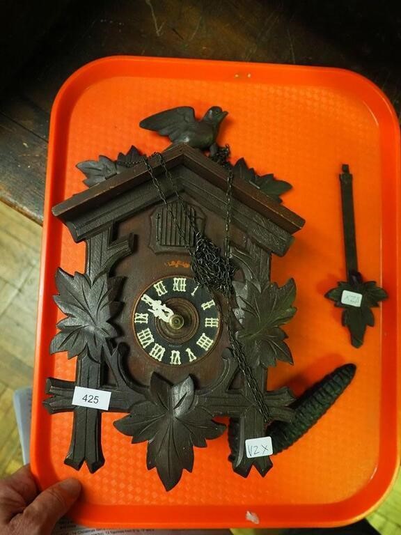 German cuckoo clock with bird on top
