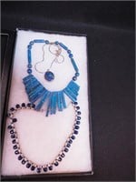 Group of lapis jewelry including two necklaces
