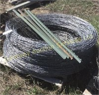 4 rolls of Barbed Wire ,4 Metal Posts