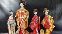Four Kimono Porcelain Geisha Dolls