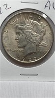 Of) 1922 piece dollar AU condition