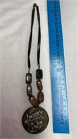 E2) necklace metal, leather, and glass beads,