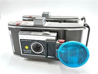 Two Model J66 Polaroid Land Cameras