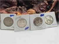 Four Silver Franklin Half Dollars
