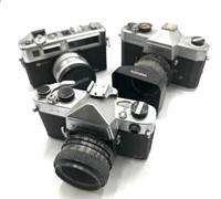 Three Yashica Camera Bodies with Lens