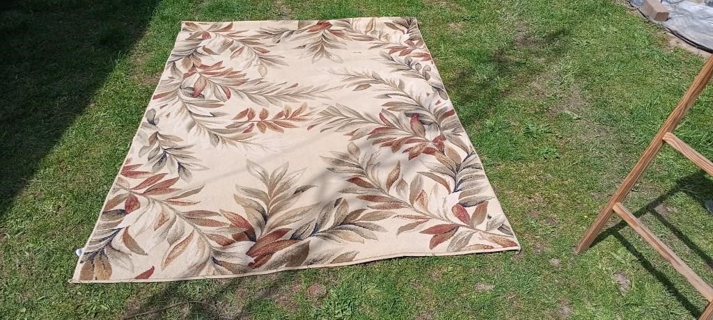 WL area rug tan floral pattern