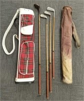 4 wood shaft golf clubs & 2 vintage golf bags
