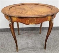 French inlaid oval table with bronze leg trim