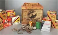 Group of shotgun shells, oil cans, etc. in an