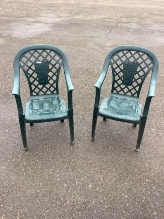 Two stacking patio armchairs