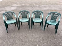 Four stacking patio armchairs
