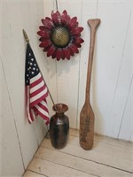 Stoneware vase, oar, metal flower