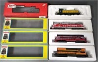 4 Atlas HO train engines with boxes - #8705,