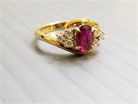 18k gold ring set with oval ruby & diamonds: