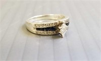 Sterling silver & 1/20 pt. ring set with a