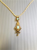 14K gold Victorian Revival pendant set with opals