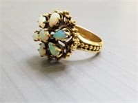 14 gold ring set with 7 opals - 6.9 grams; size 7