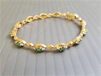 14K gold bracelet set with emeralds & small