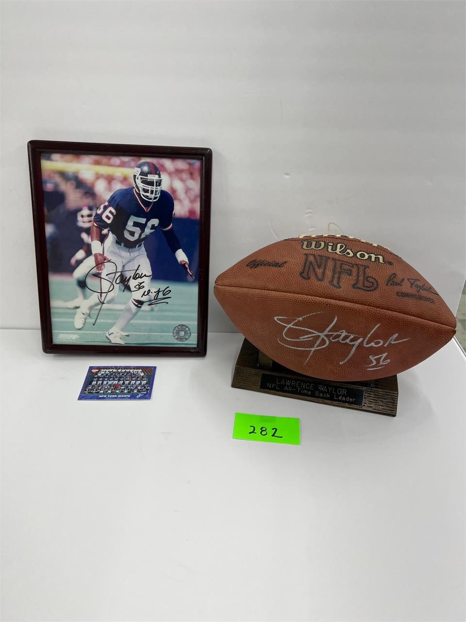 Lawrence Taylor autographed picture & football