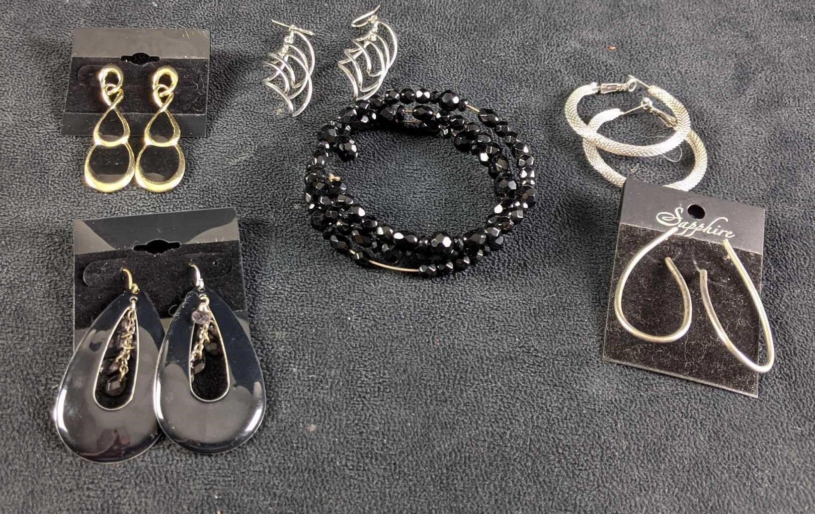 Black and Silver Colored Earrings and Bracelet