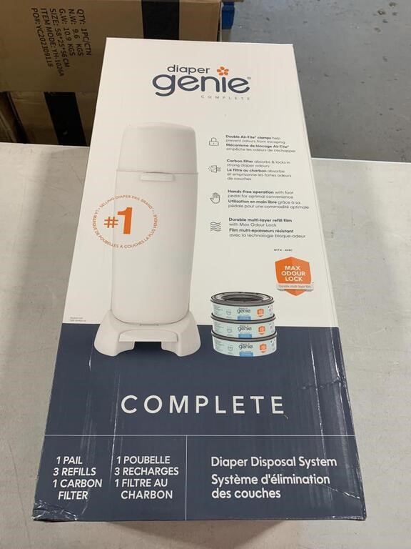 DIAPER GENIE COMPLETE PAIL AND THREE REFILLS AND