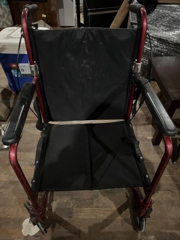 Transport chair folds in for easy storage, has