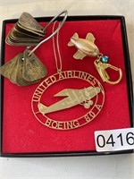 Brass Tags and Gold Colored Air Planes (living