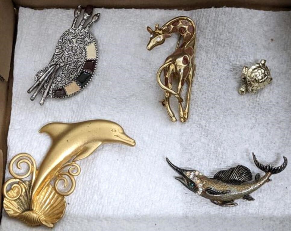 PINS AND BROOCHES