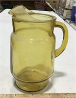 Yellow glass pitcher
