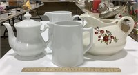 3 pitchers & tea pot