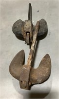 2 cast iron anchors