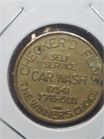 Checkered flag car wash token